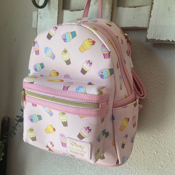 Loungefly Handbags - NWT Disney Loungefly Pastel Pink Princess Ice Cream Backpack Bag